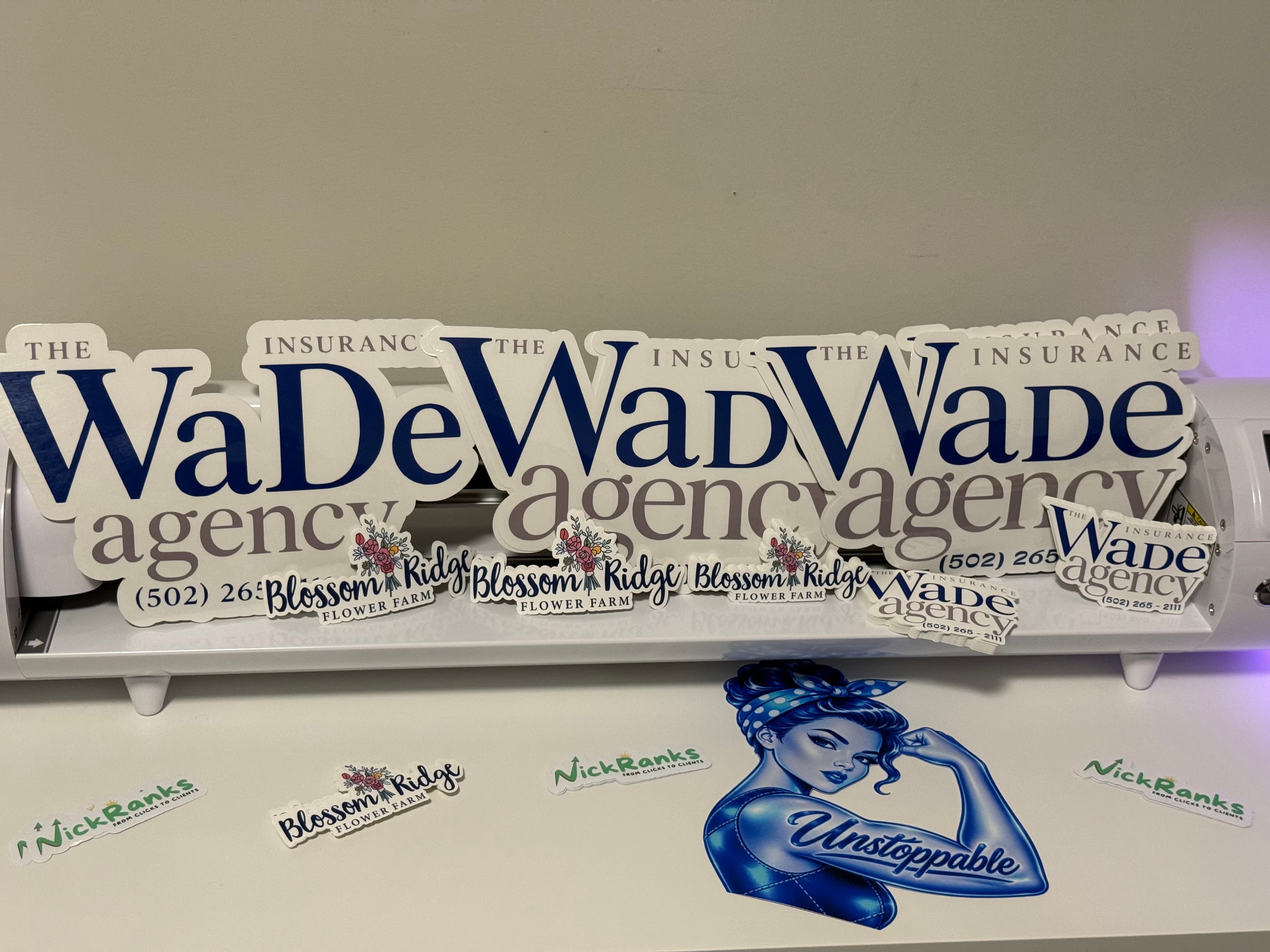 Logo pieces for Wade Agency, Blossom Ridge and NickRanks on the workbench